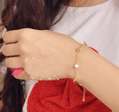 Pulsera dorada estrella