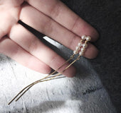 Exaggerated string studs