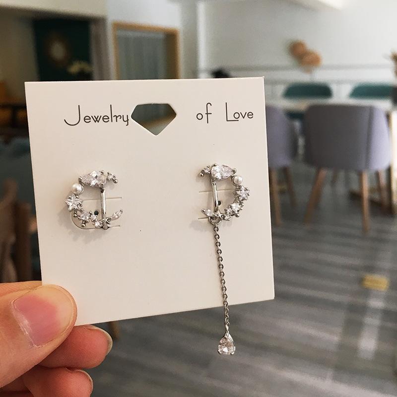 Asymmetrical moon earrings