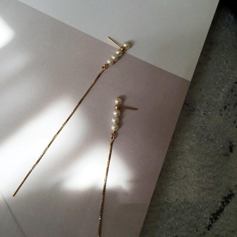 Exaggerated string studs