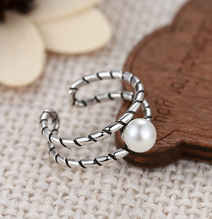Twisted pearl ring