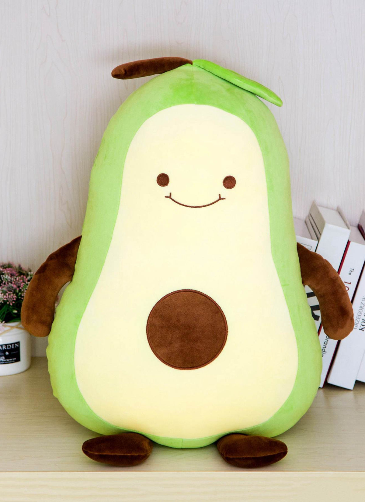 Avocado Plush Doll girl sleeping on big pillow