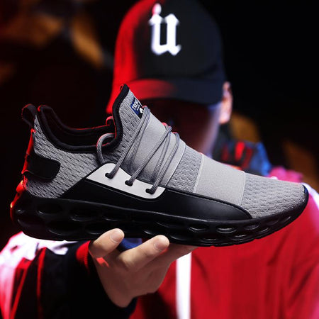 Spring and summer men's shoes fly woven running shoes low cut hollow soles cushioning breathable large size cross-country jogging casual sports shoes