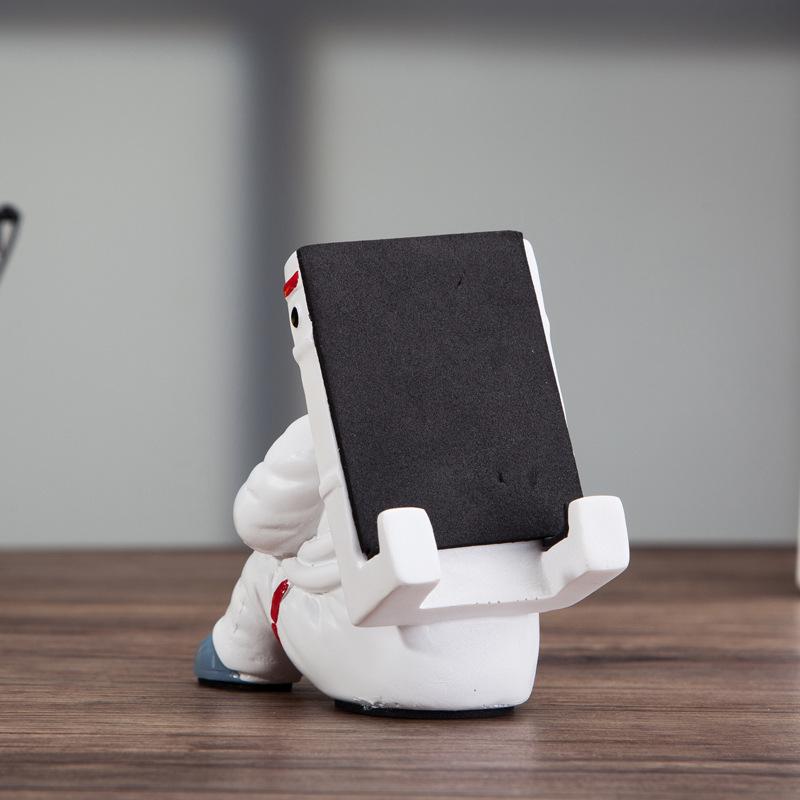 Astronaut spaceman phone holder