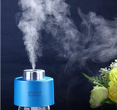 Simple household mini bottle cap humidifier