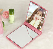 Espejo cosmético LED plegable de bolsillo