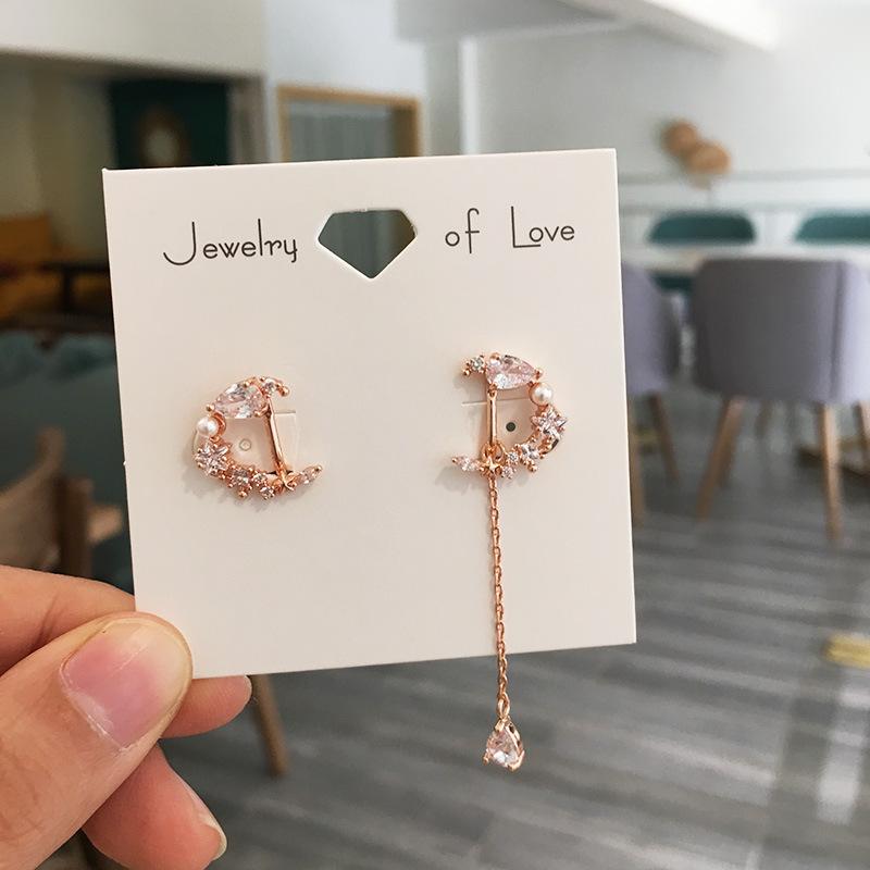 Asymmetrical moon earrings