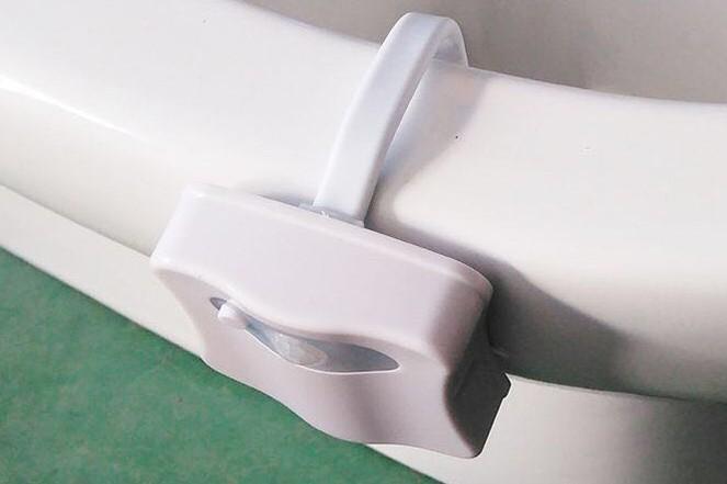 The new 8 color toilet lamp hanging human toilet cover light induction of creative gifts selling LED Nightlight