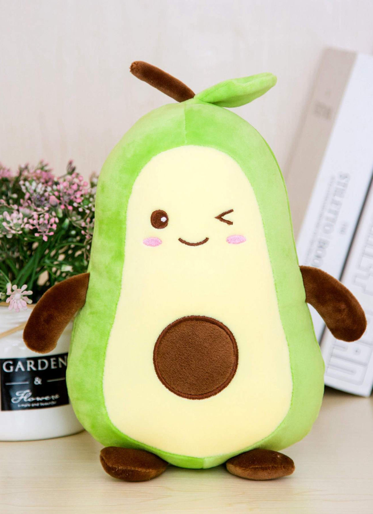 Avocado Plush Doll girl sleeping on big pillow
