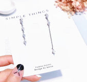 Water droplets asymmetric earrings