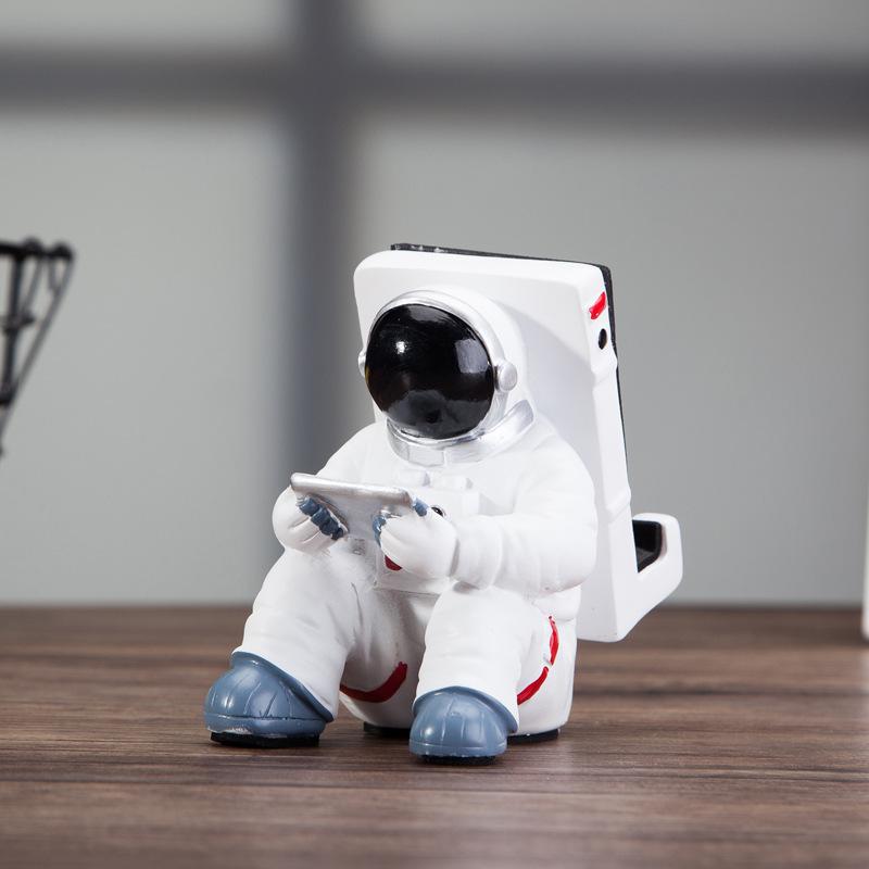 Astronaut spaceman phone holder
