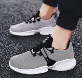 Breathable flying woven sports casual shoes shoes tide shoes running shoes