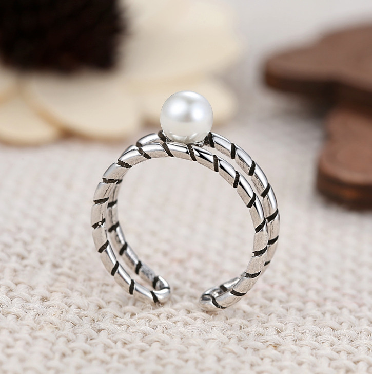 Twisted pearl ring