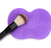Makeup brush cleaning pad