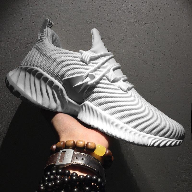 Breathable flying woven sports casual shoes shoes tide shoes running shoes