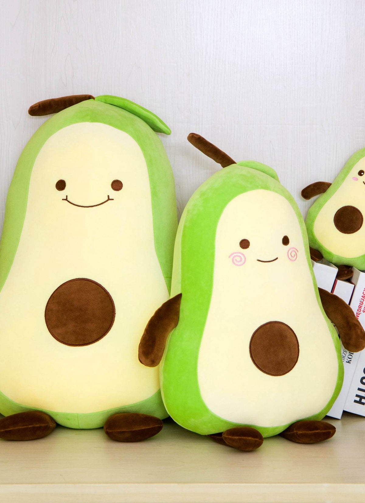 Avocado Plush Doll girl sleeping on big pillow