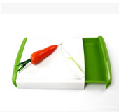 Tabla de cortadora con cajones para residuos