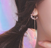 Asymmetrical moon earrings