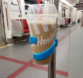 Portable public transportation cup holder
