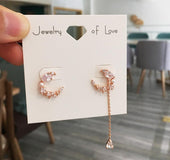 Asymmetrical moon earrings