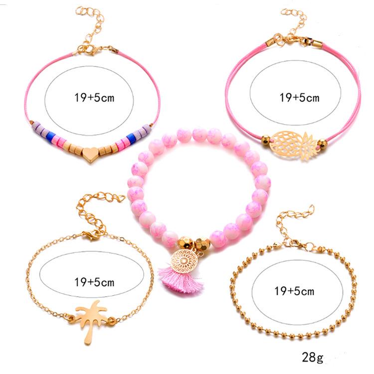 Pulsera con flecos de coco y corazón de piña
