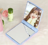 Espejo cosmético LED plegable de bolsillo